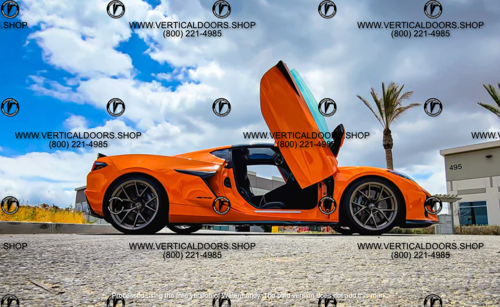 Orange sports car with open doors equipped with C8 Z06 vertical door kit by Vertical Doors Inc