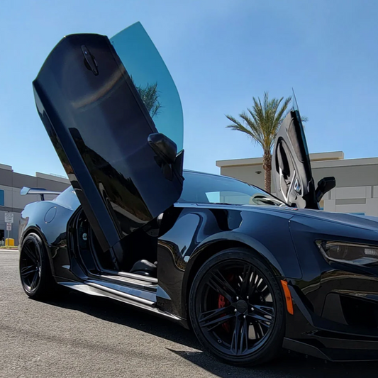 Black Chevrolet Camaro with open vertical doors featuring Chevrolet Camaro vertical door kit by Vertical Doors Inc
