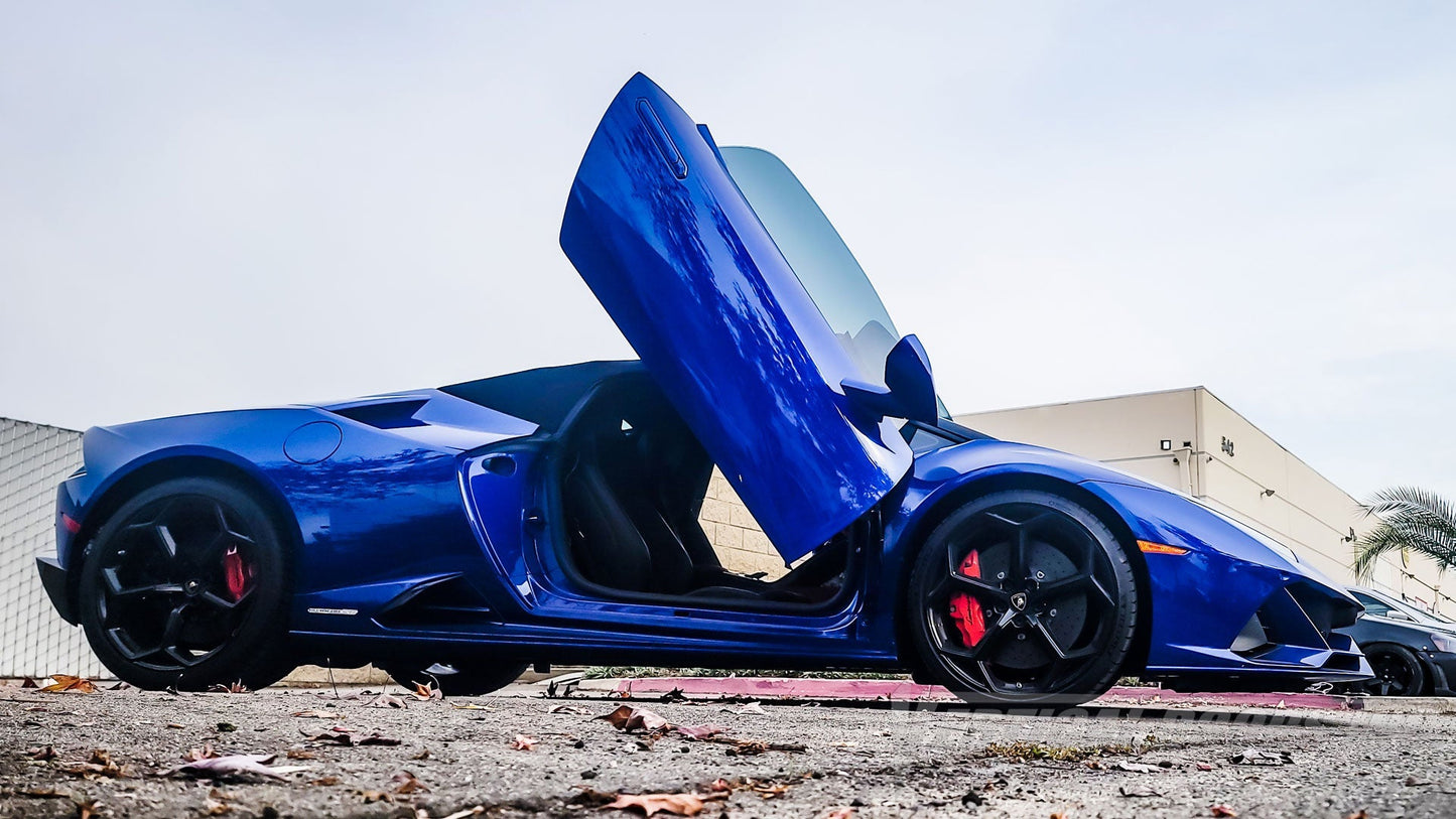 Blue Lamborghini Huracan with Vertical Doors Inc Lambo door kit for Lamborghini Huracan installed open