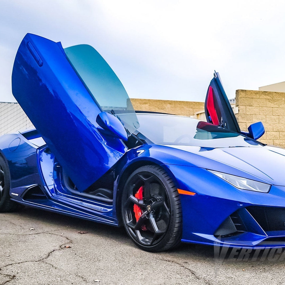 Blue Lamborghini Huracan with vertical doors open using Lambo door kit for Lamborghini Huracan by Vertical Doors Inc