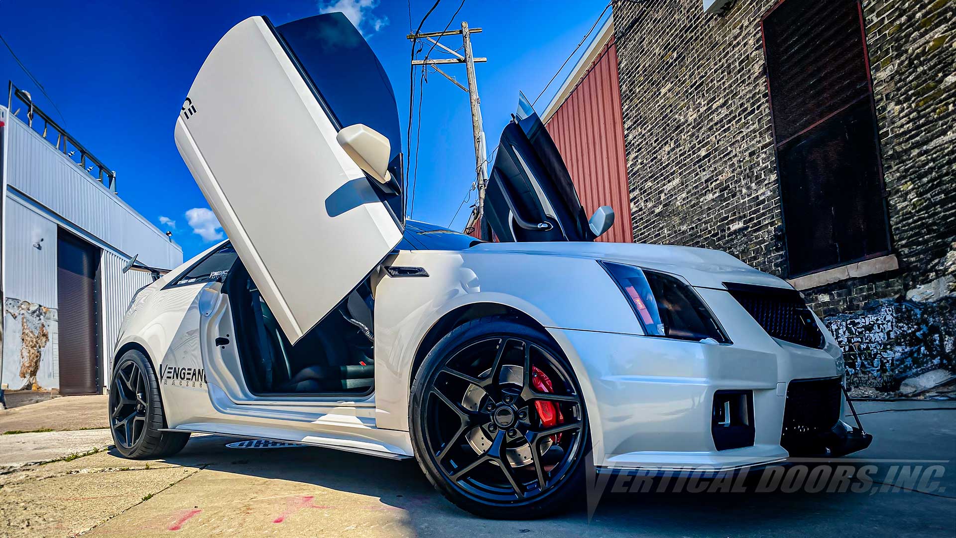 Vertical Doors Inc conversion kit for 2008–2014 Cadillac CTS Coupe - image 1