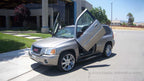 Vertical Doors Inc conversion kit for 2002–2009 GMC Envoy - image 1