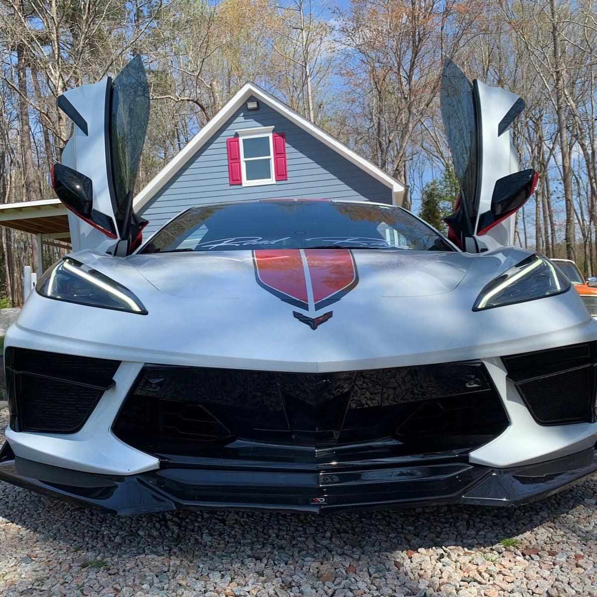 C8 Corvette with Vertical Doors Inc C8 Corvette Lambo door kit installed showcasing upward opening doors